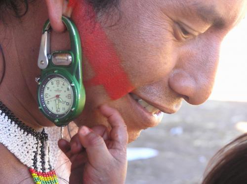 Person with compass as earring